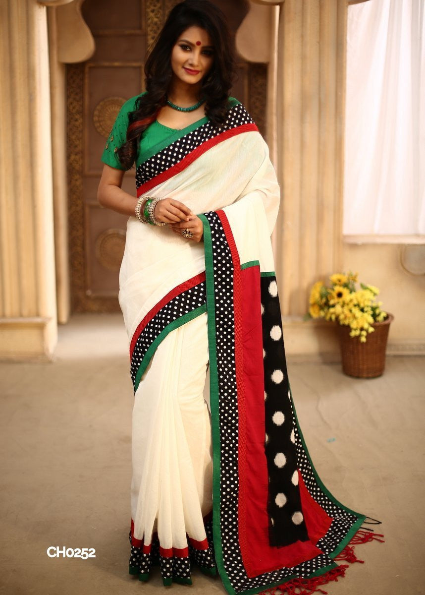 Off white chanderi with ikat pallu & polka dotted border