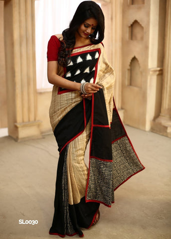 Pure tussar ghicha silk with ikat patch in front with mantra print on pleats & pallu